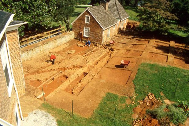 Excavators at work in the archaeological sites of Poplar Forest's Wing of Offices.