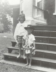 Key and Stephen Watts as children standing on the steps of the North Portico